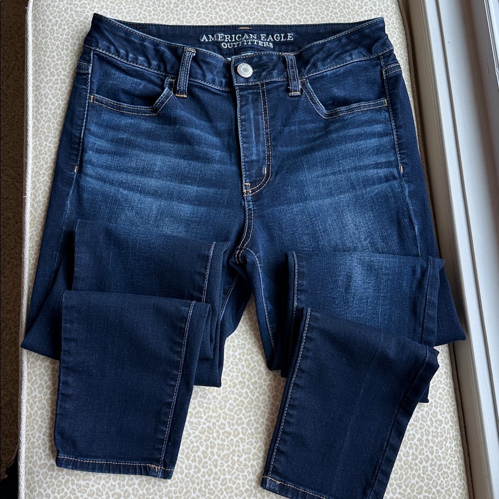 NWOT American Eagle Super Stretch Hi-Rise Jegging size 8 with acid washed areas